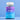 Eine Flasche INAO von essence Dream & Chill Gummies steht aufrecht vor einem hellblauen Hintergrund und präsentiert ihr blaues und violettes Etikett mit weißem Text.