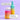Zwei Produkte von INAO by essence aus dem Get Stronger Sparset – eine Pumpflasche und ein Vitamintiegel – werden auf einem hellen Lavendelgrund mit deutschen Textblasen gezeigt, die die sanfte Reinigung, die Unterstützung der Hautbarriere und die Vorteile für gereizte Haut hervorheben.