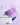 Ein lavendel- und hellblaues Glas Happy Evenings Sparset von INAO by Essence steht auf einem Cremeschmierer. Text lautet: „SCHRITT 4 – PFLEGE. Happy Evenings Sparset. Für optimale Hautpflege sanft in die saubere Haut einmassieren.“.