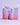 Zwei rosa-violette INAO by essence Fine Time Pore Minimizer Serum Refill-Packungen stehen auf einem lavendelfarbenen Hintergrund. Die Bläschen betonen Azelainsäure, ihre mattierenden und porenverfeinernden Eigenschaften und die Eignung für fettige Haut.