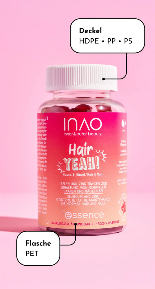 Eine rosa Flasche des Nahrungsergänzungsmittels INAO Hair Yeah! mit weißem Deckel. Der Deckel besteht aus HDPE-, PP- und PS-Kunststoff, die Flasche aus PET. Der Hintergrund ist einfarbig rosa.